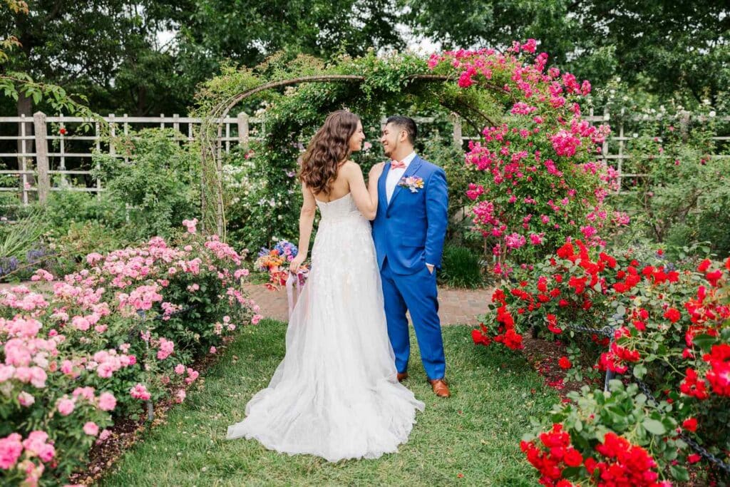 Beautiful bride and groom's photoshoot in gorgeous flower garden