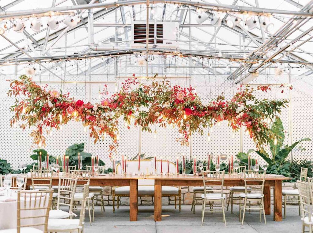 Greenhouse Garden Wedding Venue with beautiful suspended hanging greenery arrangement