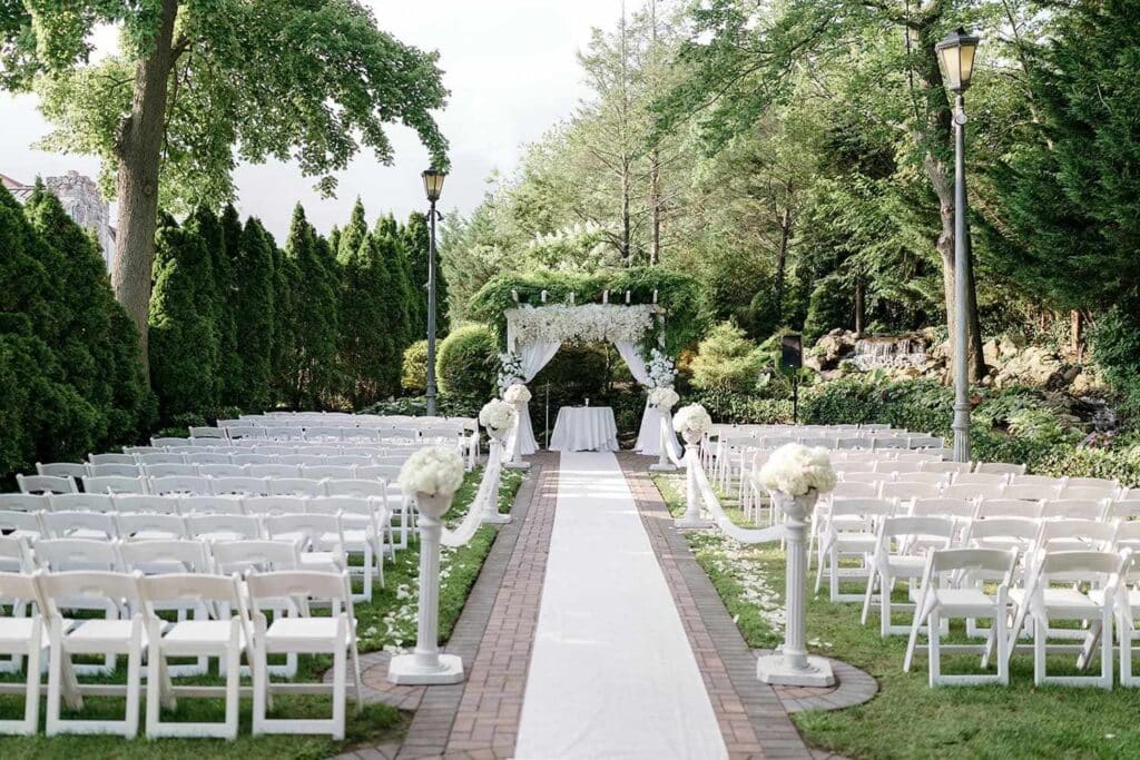 Outdoor Garden Wedding with fabric aisle runner