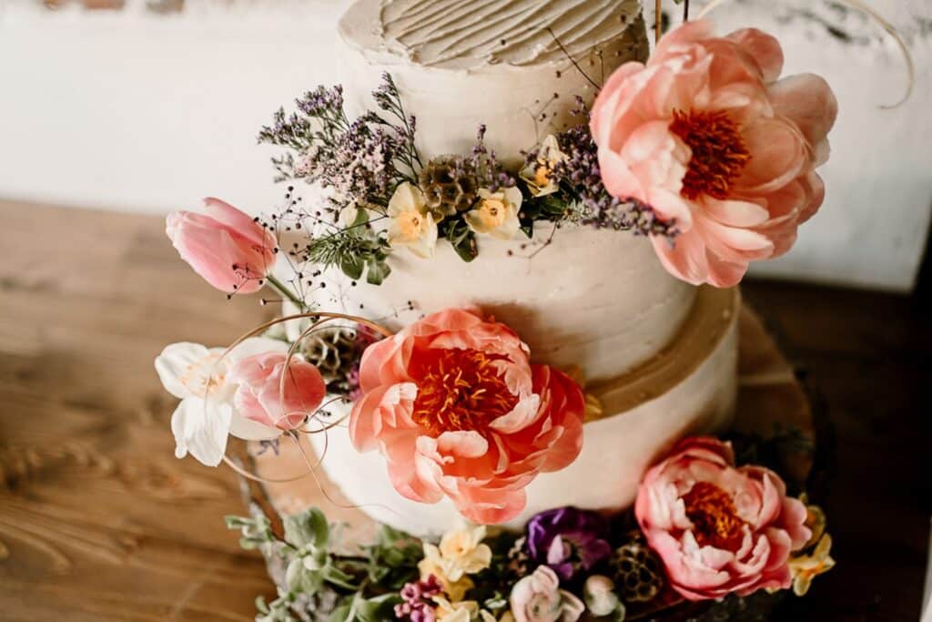 2-tiered cake with fresh flowers