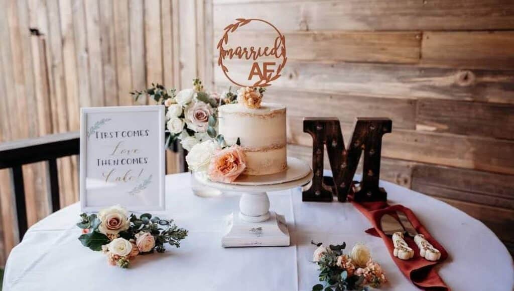 Boho-Inspired Cake with gold Monogram topper