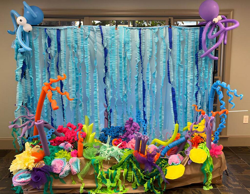 Underwater inspired birthday party decor with Streamers and balloons