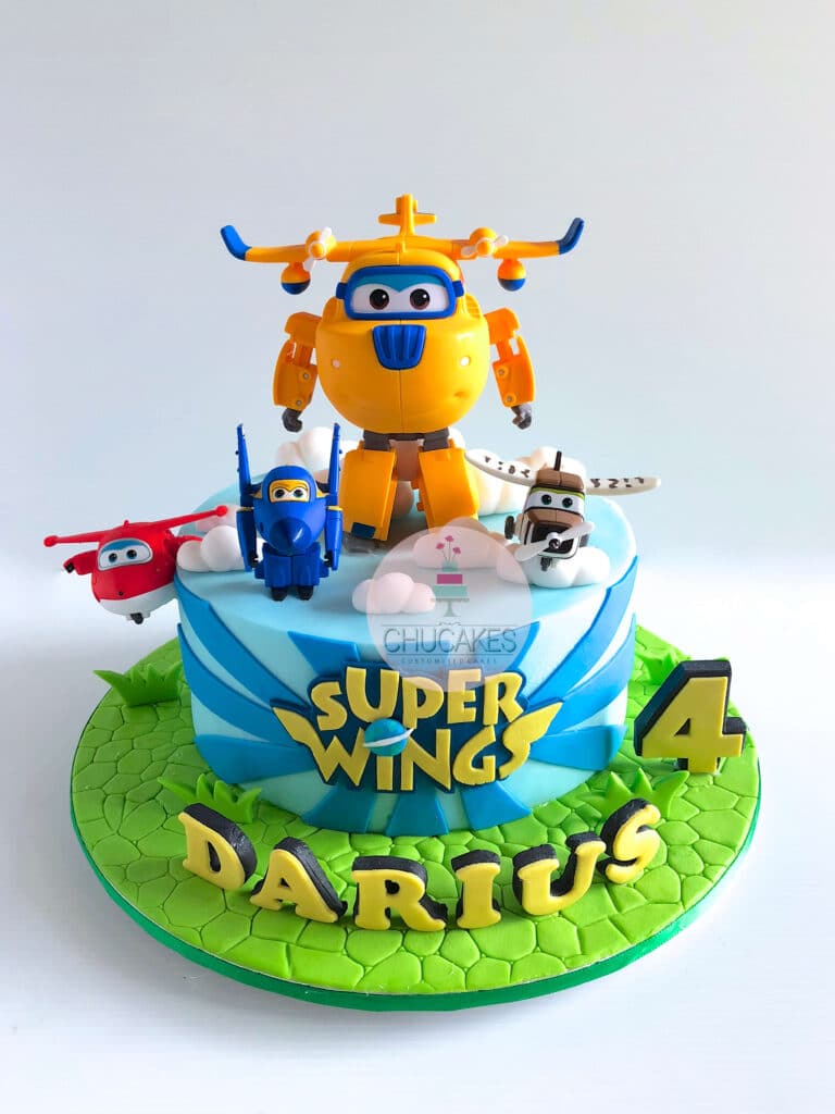 Super Wings Cake with adorable Donnie, Jett, Bello and Jerome Figurines