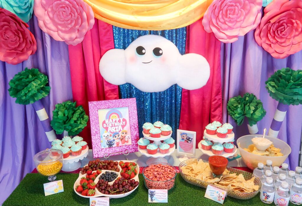 True and the rainbow kingdom birthday decor with colorful streamers, balloon and more