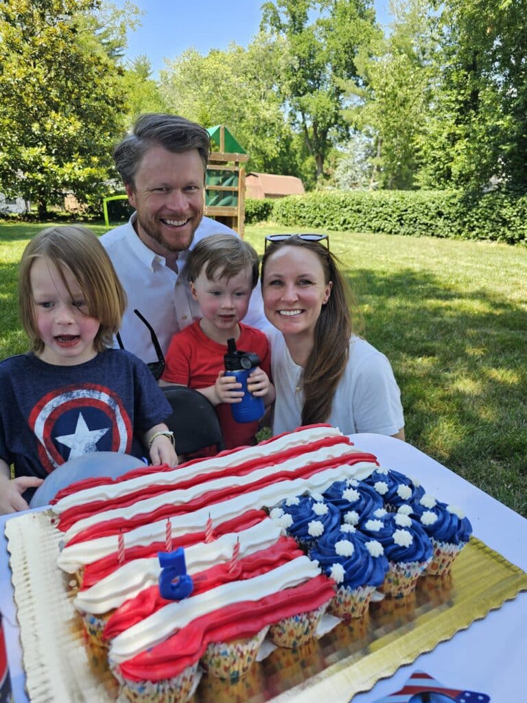 Happy family celebrate their kid's birthday with Captain America themed birthday