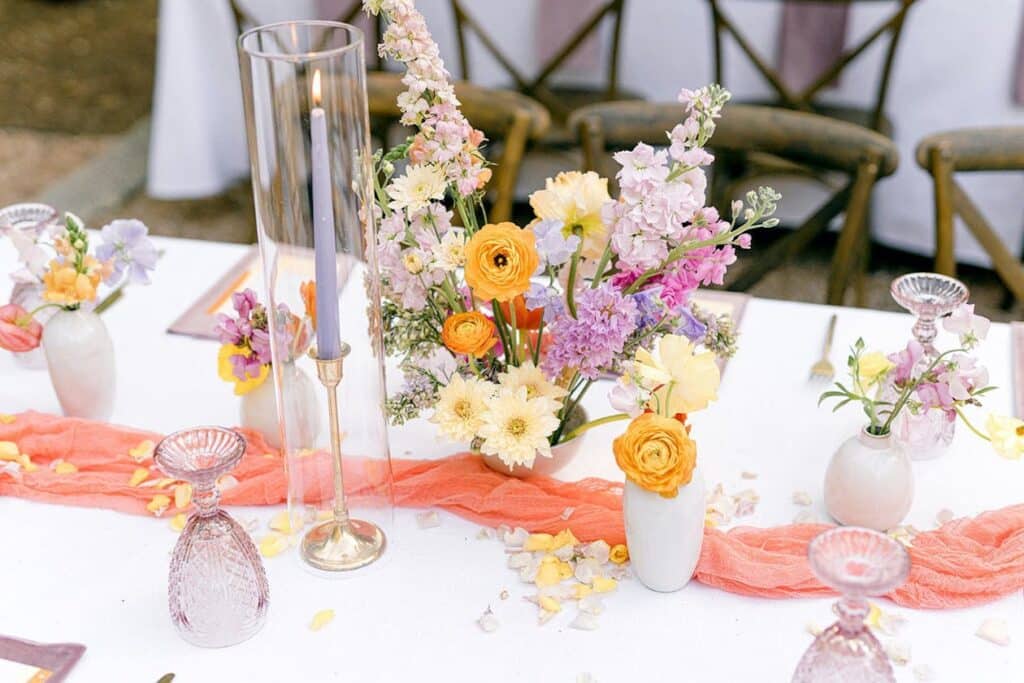 Table Decor with White Candle and floral centerpieces