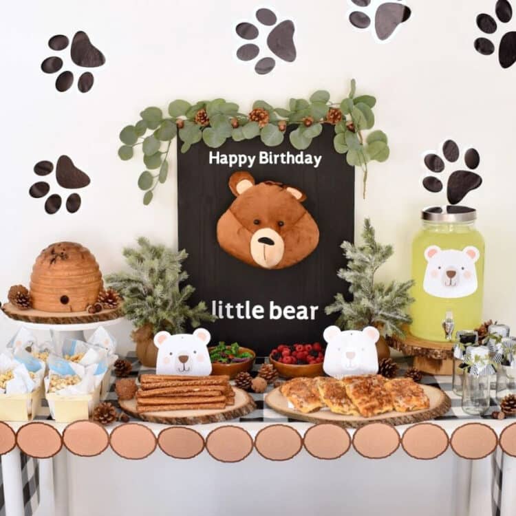 Teddy Bear Table Decor With Bear Plates and paw prints on wall