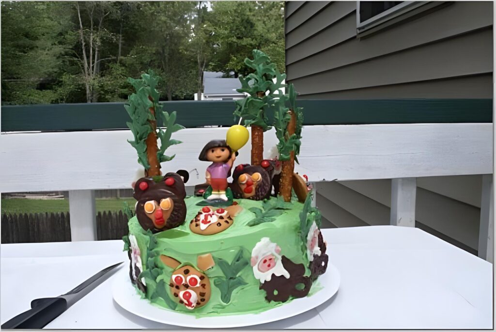 Dora The Explorer Birthday Cake With Jungle Theme, Green Fondant, Greenery And Dora Topper