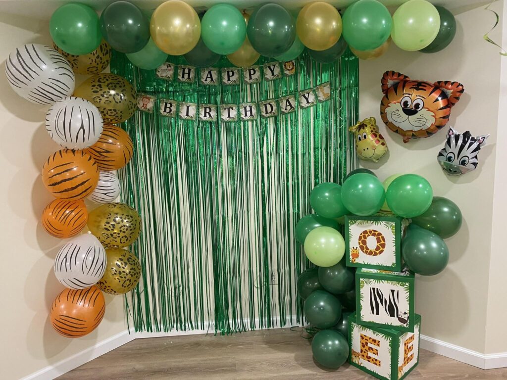 Green Streamers and balloon garland for Wild Jungle Animal Birthday Party Decor