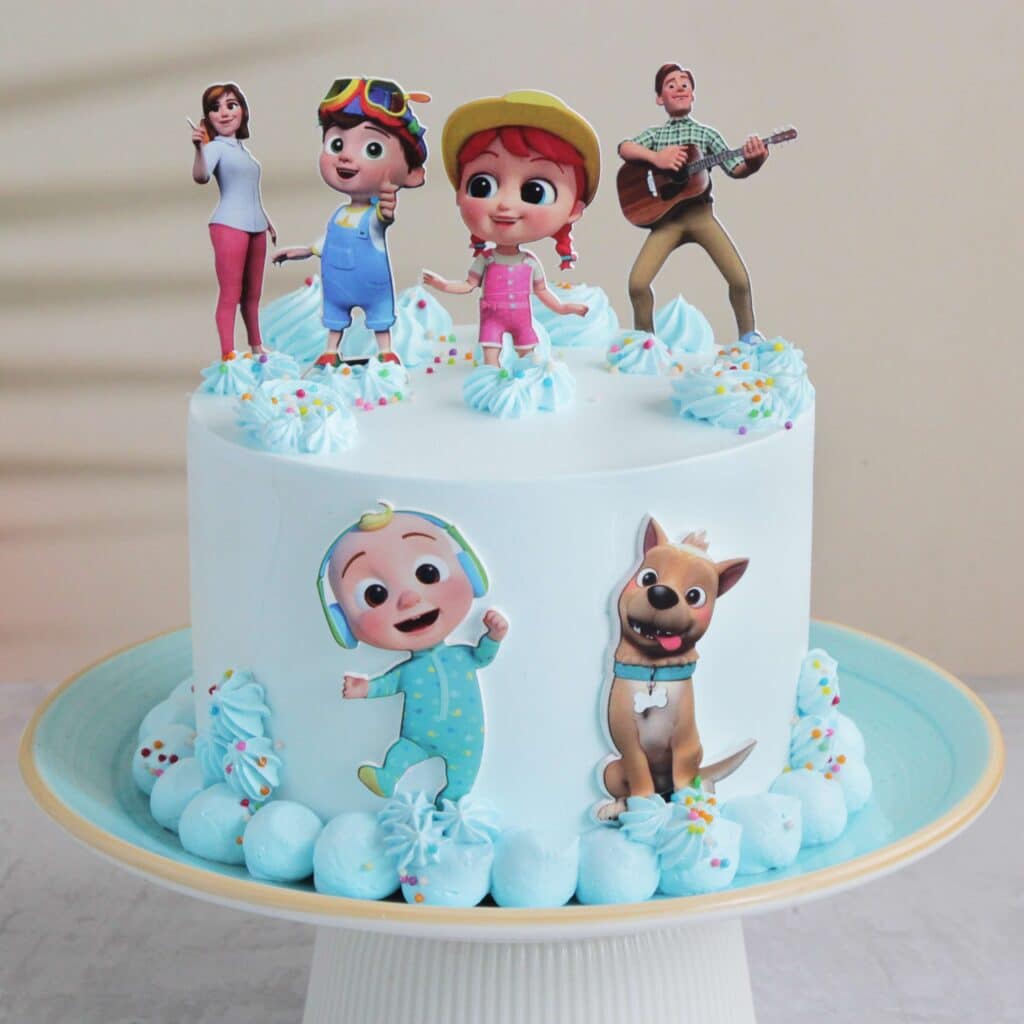 Cocomelon Birthday Cake with adorable JJ, TomTom, Nina and YoYo Character Topper