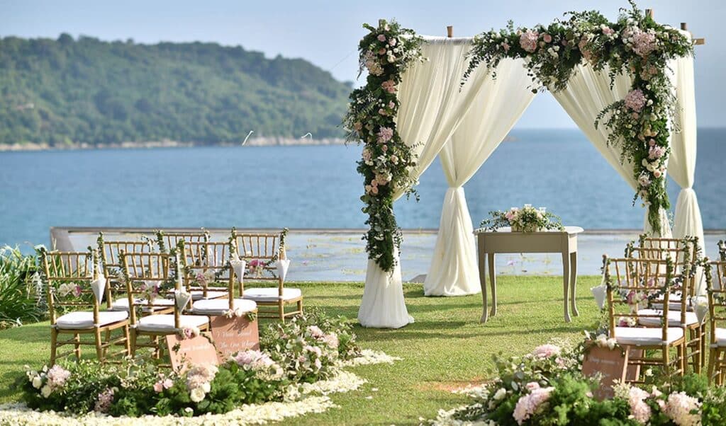 Gorgeous seaside wedding venue with whimsical Wedding Arch