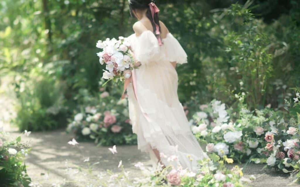 Beautiful Bride holding flower bouquet