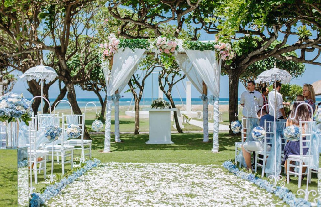 Dreamy Garden Seaside Wedding with floral petal aisle runner