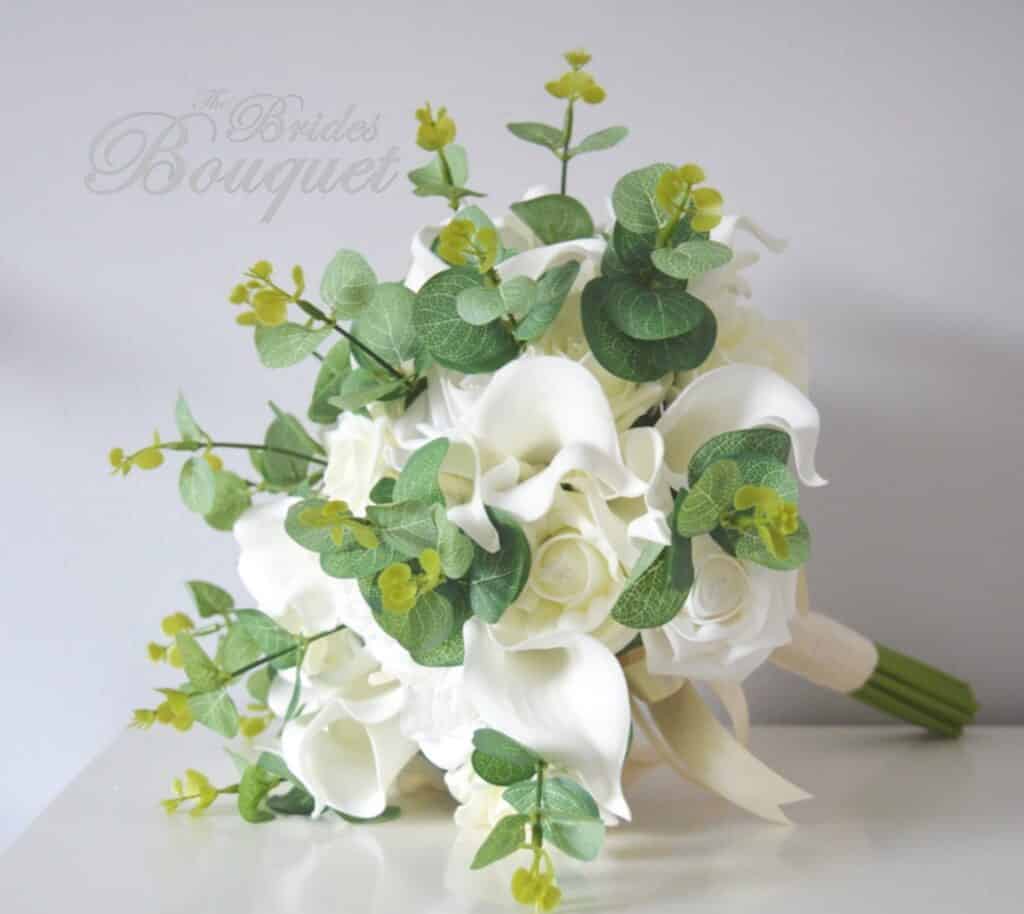 White Lily Flower and eucalyptus arrangement Bouquet