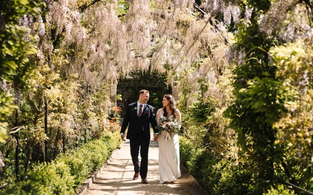 Bride and Groom in a photoshop with gorgeous Botanic Garden Wedding Setup