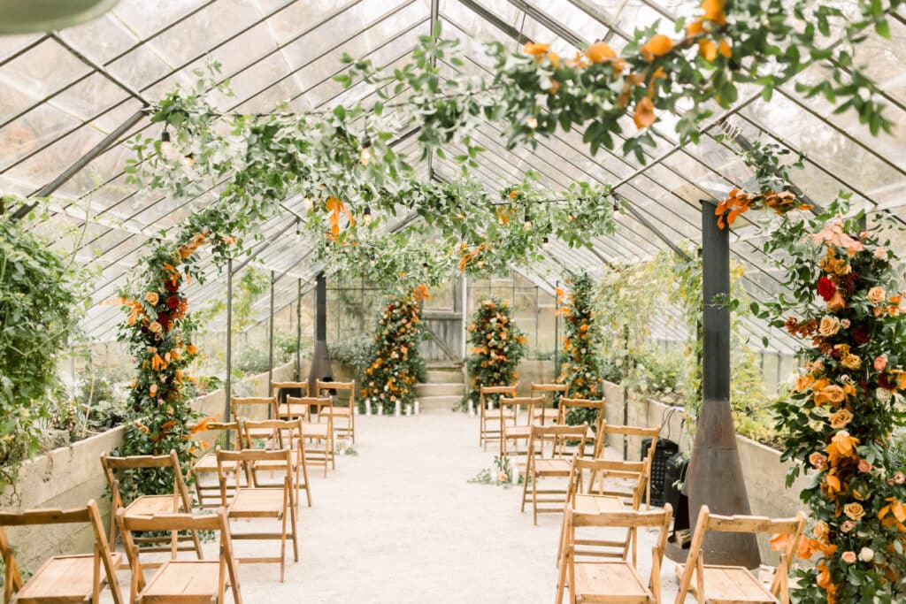 Rustic Greenhouse Wedding with Draped Greenery Decoration