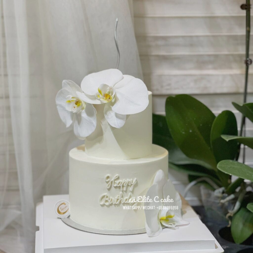 Pristine White Orchid Tower Wedding Cake