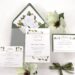 Magnolia Floral Wedding Invitations (Credit: camelliamemories)