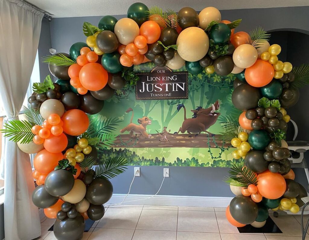 Green and brown balloon arch