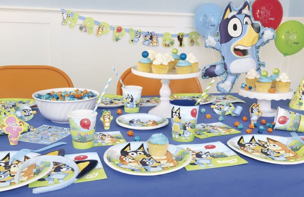 Bluey themed party plates, bunting flags and cups