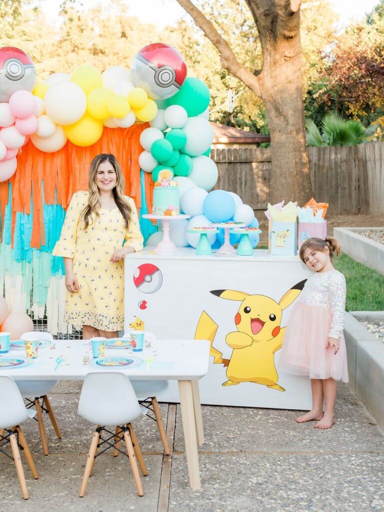 Colorful pastel pokemon inspired balloon arch, and diy cardboard Pikachu cutout