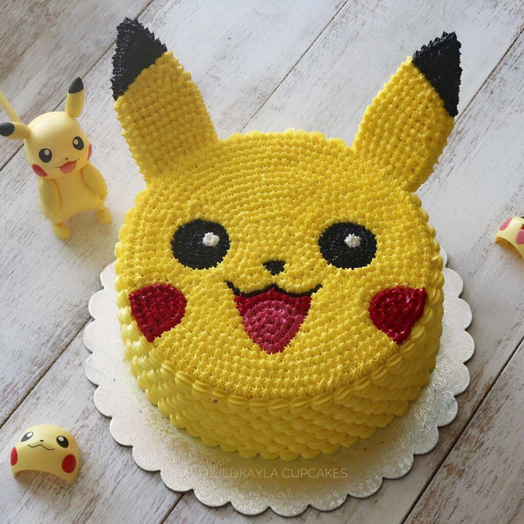 Adorable Pikachu Face Birthday Cake with yellow buttercream frosting